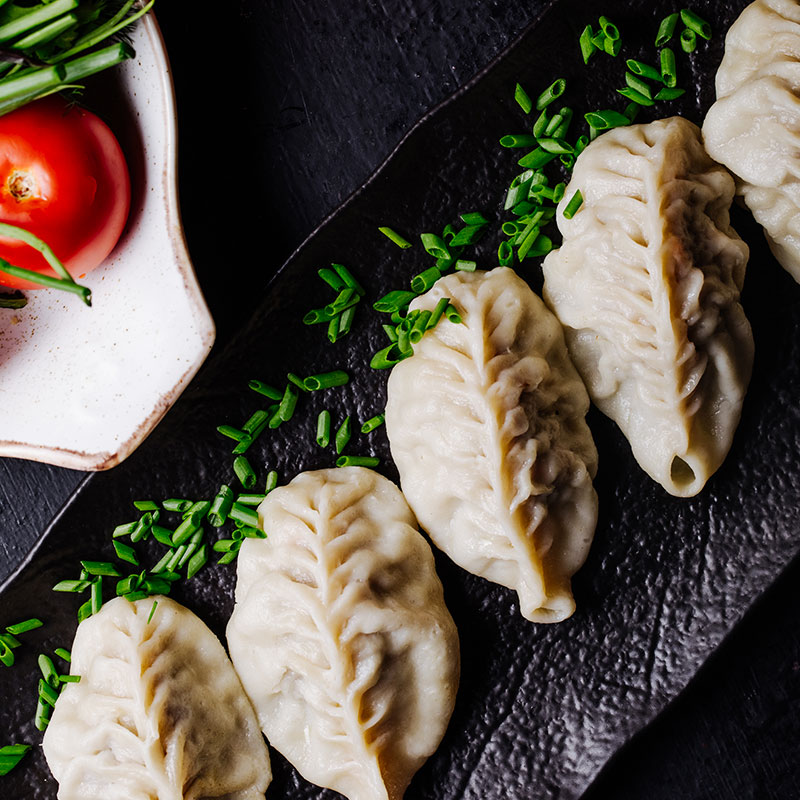 frozen chilly sweetcorn momo, frozen momo, frozen momo near me, frozen chilly sweetcorn momo packet, frozen momos packet, frozen momo packet near me